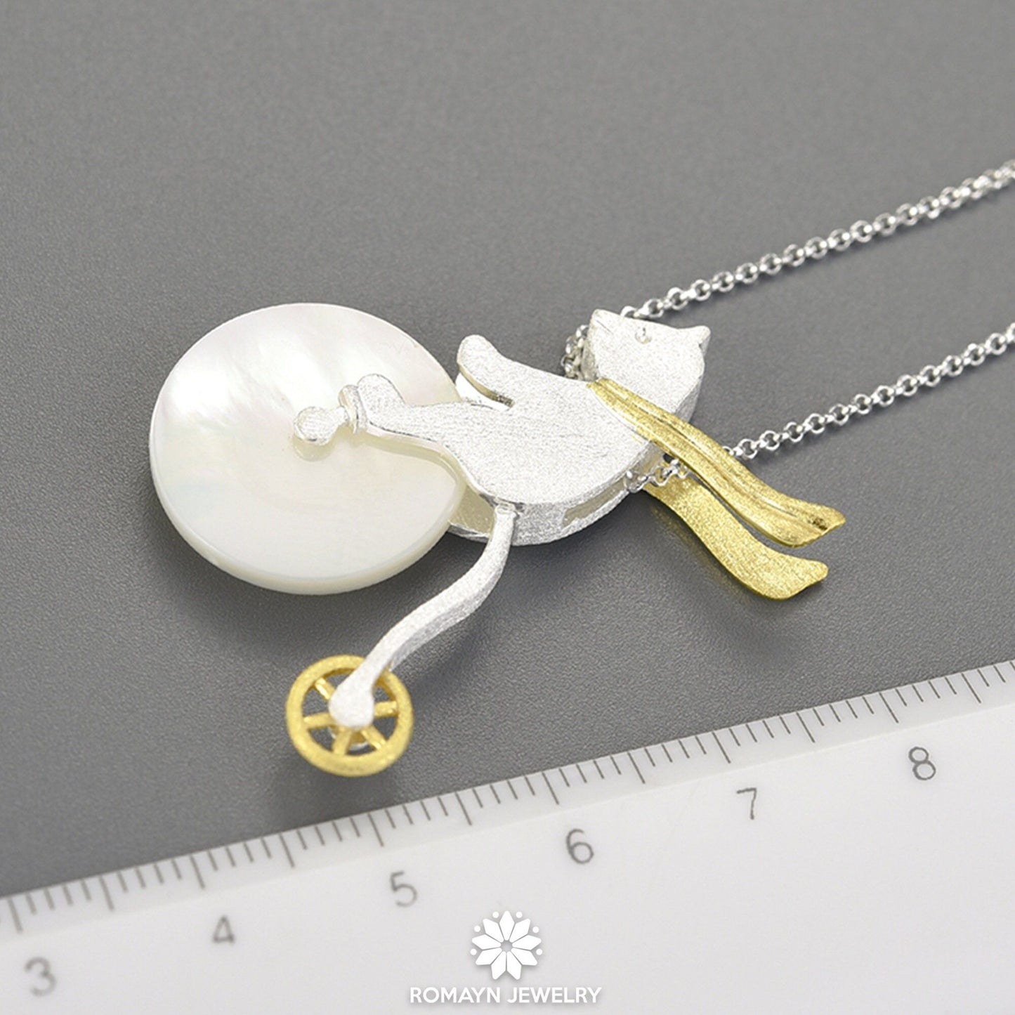 Bicycle Riding Bear Necklace