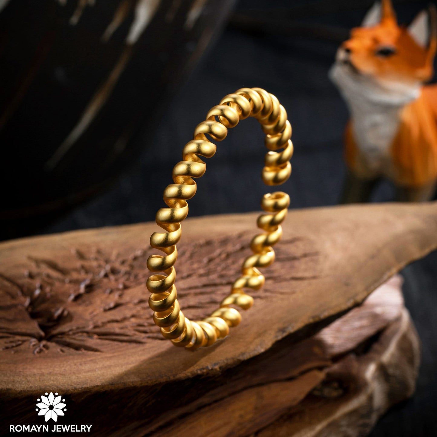 Spiral 18K Gold Bangle